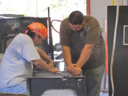 Gerardo Munoz, Master Blower and his son, beginning the demo